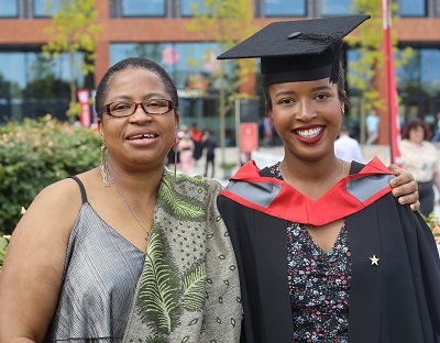 Kuda Phiri pictured with her mother at graduation