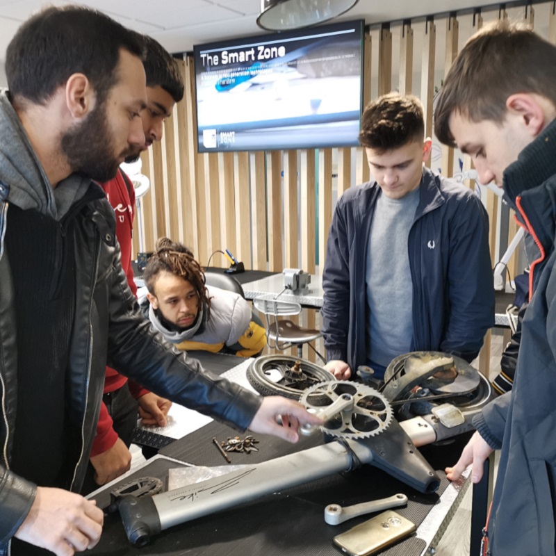 A group of engineering students working the Smart Zone's maker space