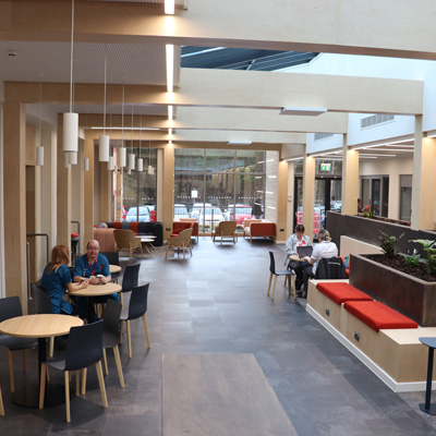 The new atrium, featuring a variety of informal collaborative and social spaces.