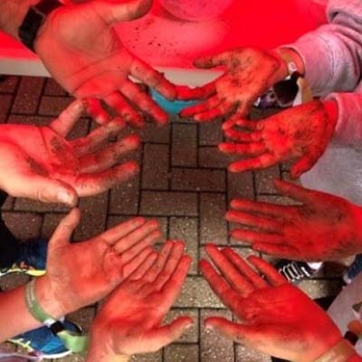 Dirty hands after planting seeds