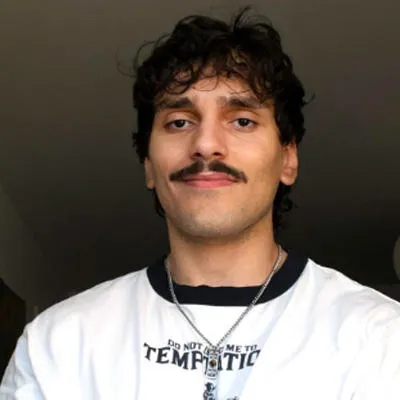 A portrait photo of Max smiling