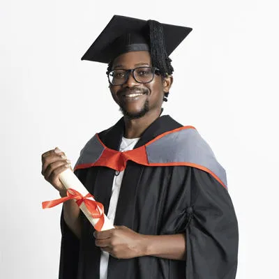 Tendai wearing a graduation cap and gown