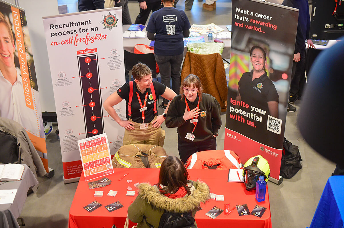 Fire Service talk to a student at the Apprenticeship Fair