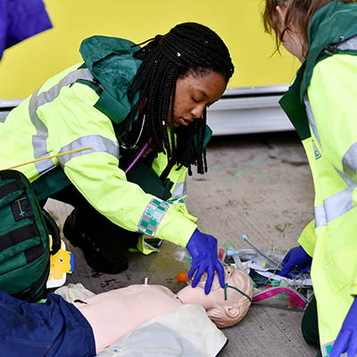 female paramedic in training