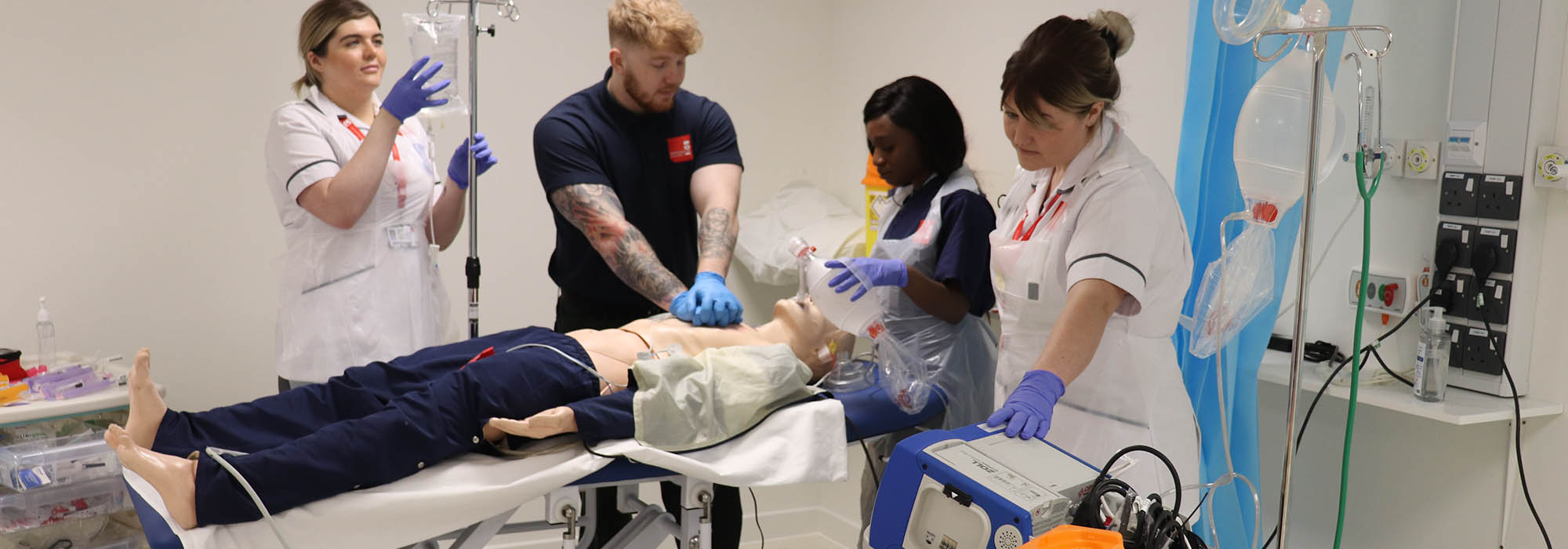 Clinical team take part in a training exercise in our simulation suite using a medical dummy