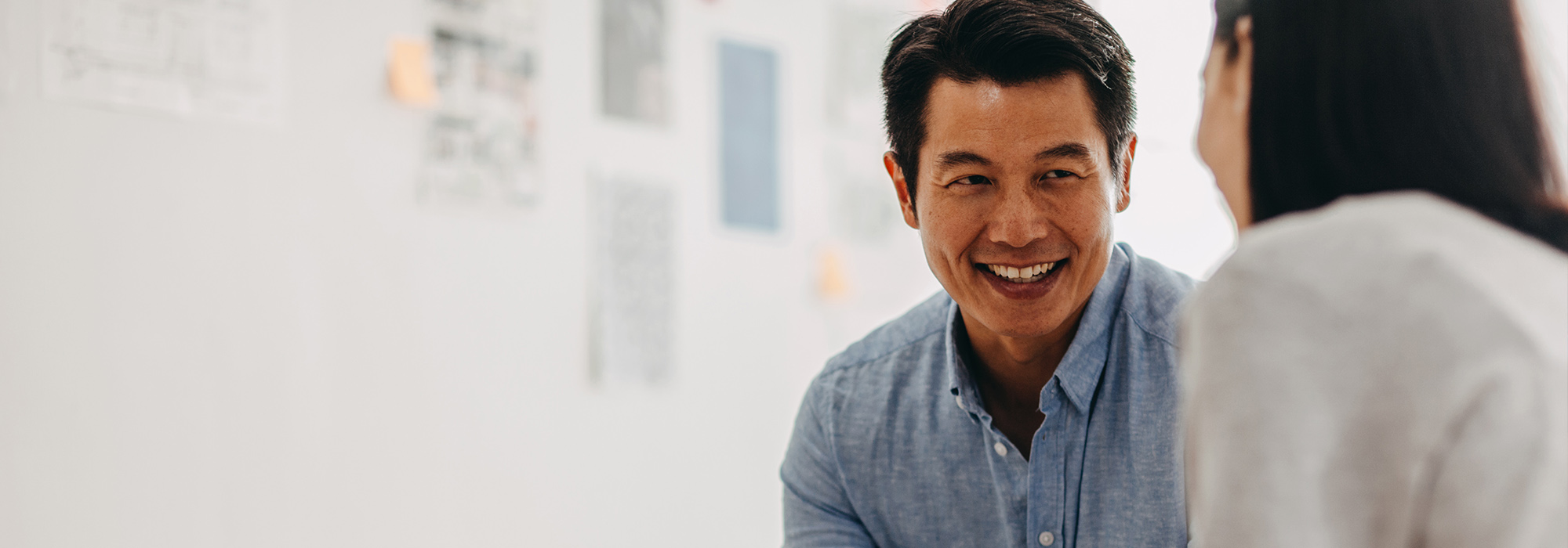 male business owner smiling