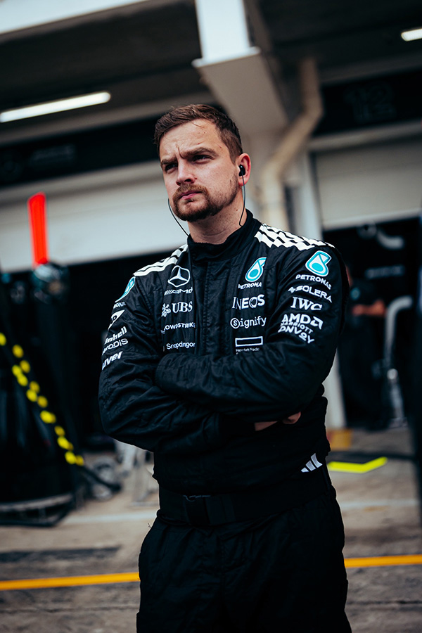 Zac is wearing his black motorsports uniform