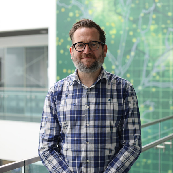 Dean Northfield, Senior Lecturer is standing in the Science Building