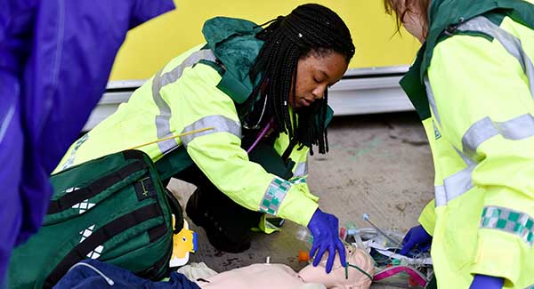 female paramedic taking part in a training course