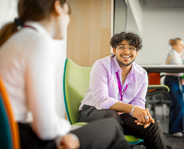 Students chatting smartly dressed