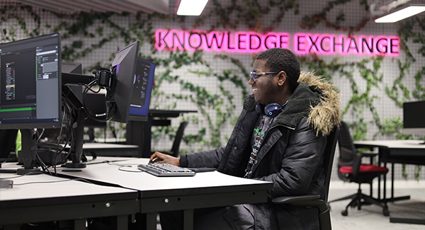 student at Staffordshire University London using PC in knowledge exchange