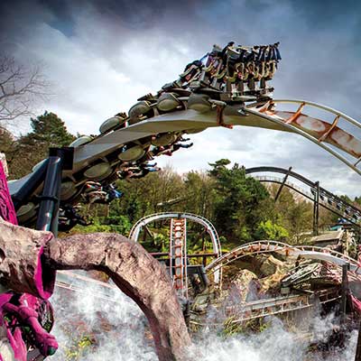 The Nemesis rollercoaster in motion at Alton Towers