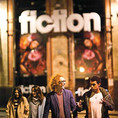 Students walking outside of the Fiction nightclub in Hanley in the evening