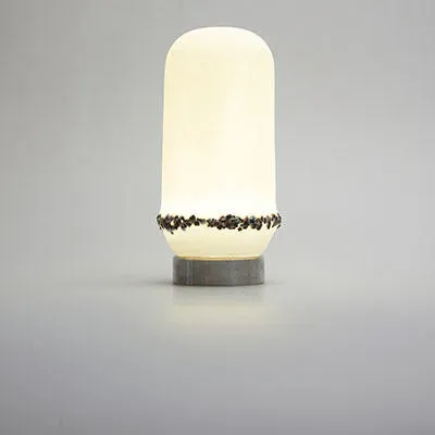 Lighting with infused iron lathe shavings by Megan Keeling.