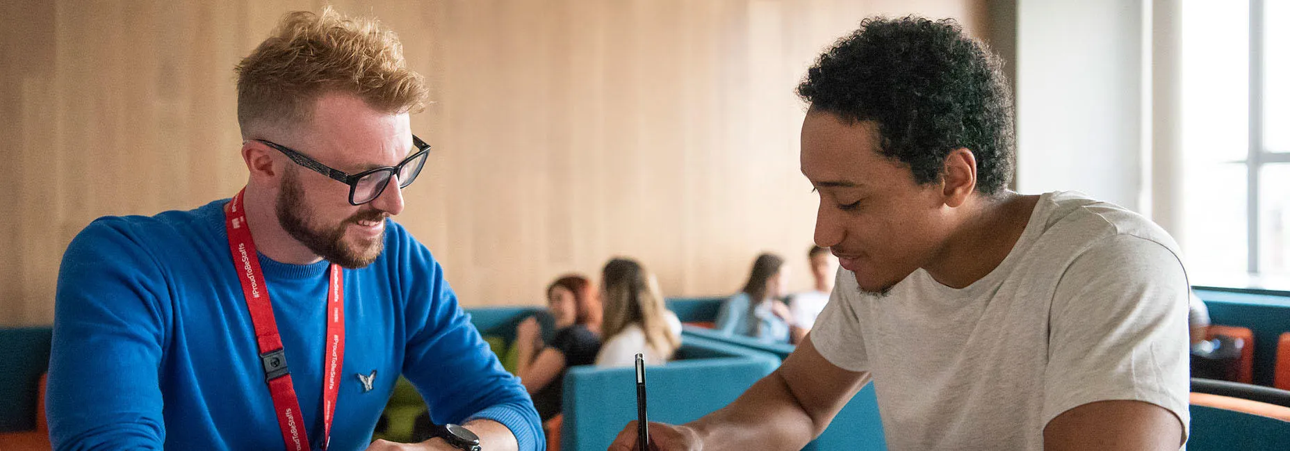Student talking to an ambassador