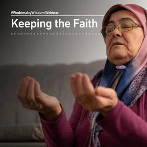 Woman in a headscarf raises her hands in prayer beneath the words 'Keeping the Faith.'