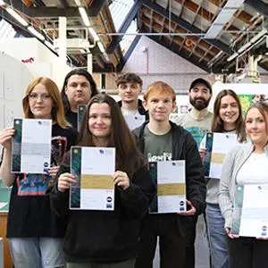 Brief Cases winners with their certificates