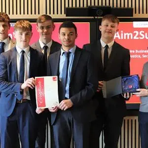 The winning team being presented certificate and award