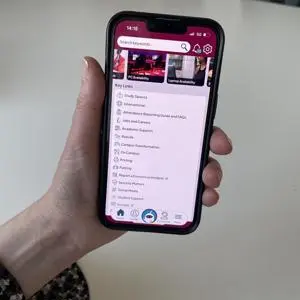 Hand holding a phone