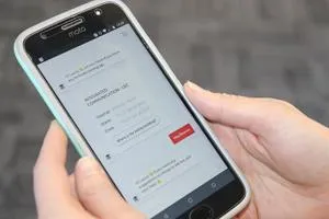 Close up of hand holding a mobile phone