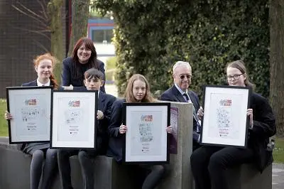 Big Read prize winners holding their certificates