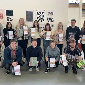 Brief Cases 2022 winners holding their certificates