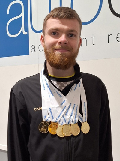 Cameron Sargent pictured wearing his six gold medals