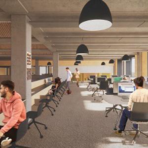 An artist's impression of a flexible learning space in our new Catalyst building showing a large room with many desks and computers and students sitting at some of them.