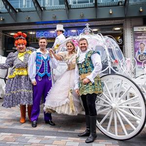 The cast of Cinderella in front of the Regent Theatre