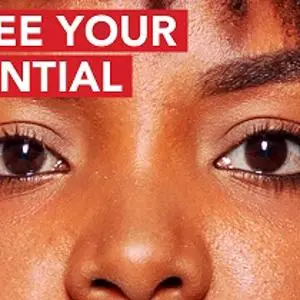 Close-up of a woman's eyes beneath the words 'WE SEE YOUR POTENTIAL' and a university logo.