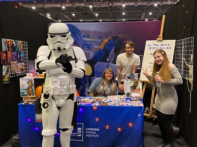 Students pictured with a Stormtrooper at the comic con event