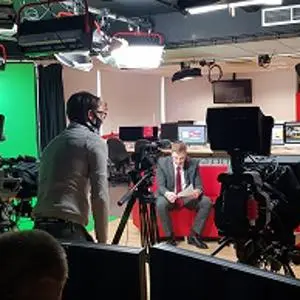 students using filming equipment