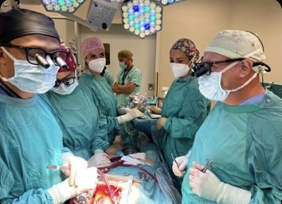 Students observing the work of physicians in an operating department