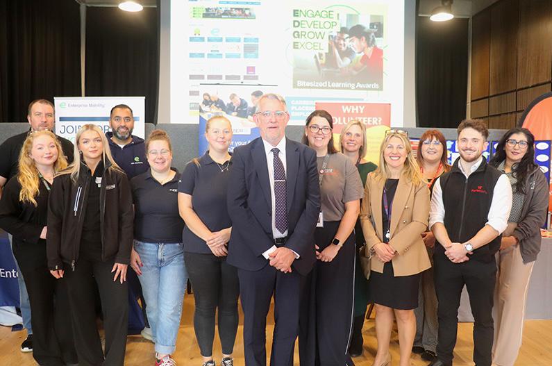 Professor Martin Jones pictured with a group of employers
