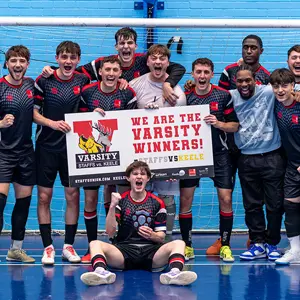 The Futsal team celebrating their Varsity win