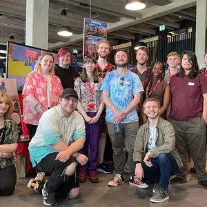 A group of Staffordshire University students in front of their stand at Game Republic