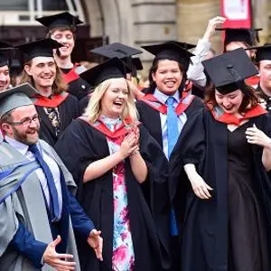 graduates in cap and gown
