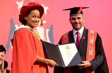 Jazmine Sawyers receiving her honorary degree