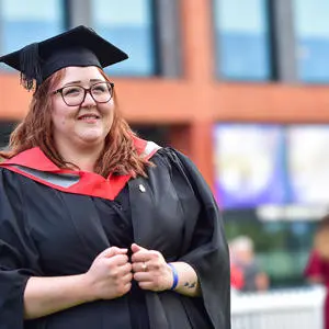 Jessica Rodgers in her graduation cap and gown