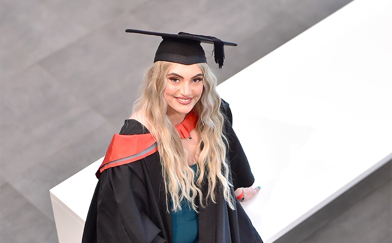 Jord Andrews in her graduation cap and gown