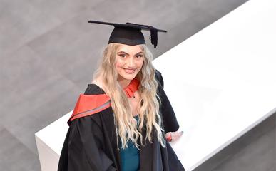Jord Andrews in her graduation cap and gown