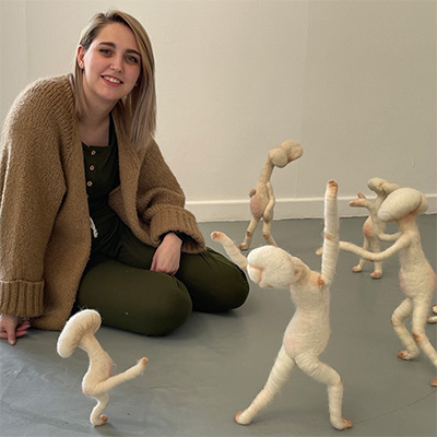 Kite Myers pictured with some of her mushroom sculptures