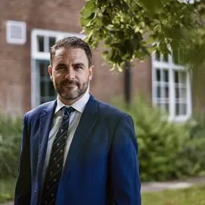 Man wearing suit and tie