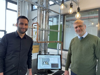 PhD researcher Hossein Sheykhpoor and Professor Hamidreza Gohari Darabkhani stood by the Micro Turbine 