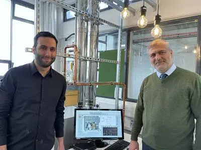 PhD researcher Hossein Sheykhpoor and Professor Hamidreza Gohari Darabkhani stood by the Micro Turbine