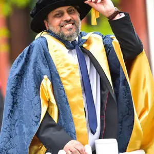 Mohammed Ramzan in his honorary doctor hat and gown