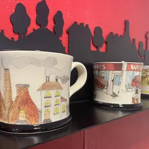 Mugs designed by the school pupils featuring bottle kilns