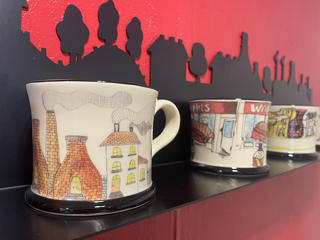Mugs designed by the school pupils featuring bottle kilns