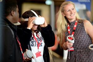 An image of students trying out VR at a fair