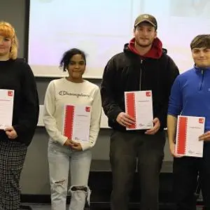 Popcorn bursary winners with their certificates